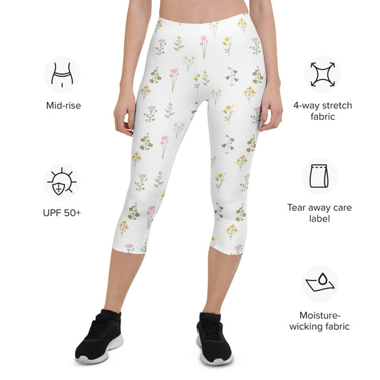 Side profile of Petal Pulse white leggings showing flattering fit and colorful flower pattern
